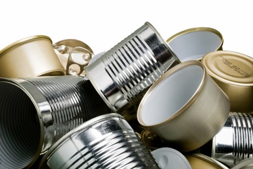 Technician assisting with flat clearance, demonstrating accessible on-site practices in Greenwich